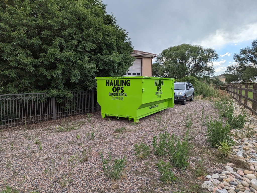 Hauling Ops - Dumpster by house